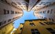 Traboule in Lyon. Original and symetrical shot of buildings and blue sky