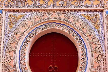Ornate, tiled doorway with round door