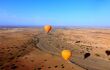 Hot-air balloons flying over the Moroccan desert