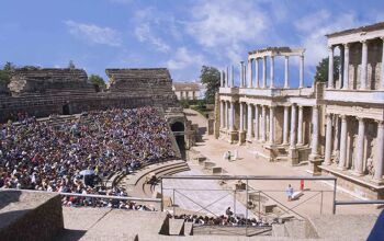 Tourist crowds watch a performance in the Merida amphitheatre