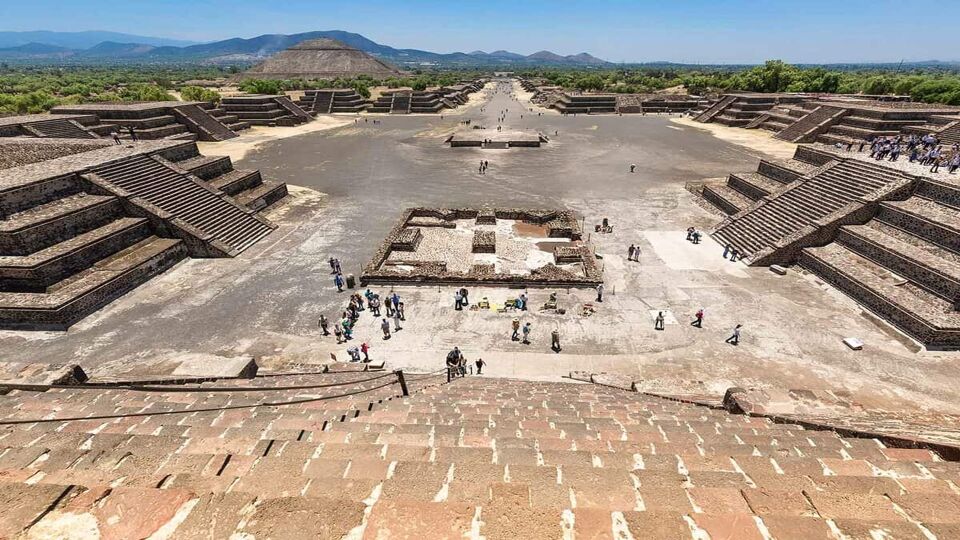 view from the top of pyramid in Teotihuacan down the Avenue of the Dead