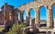 archways at the ruins of Volubilis, Morocco