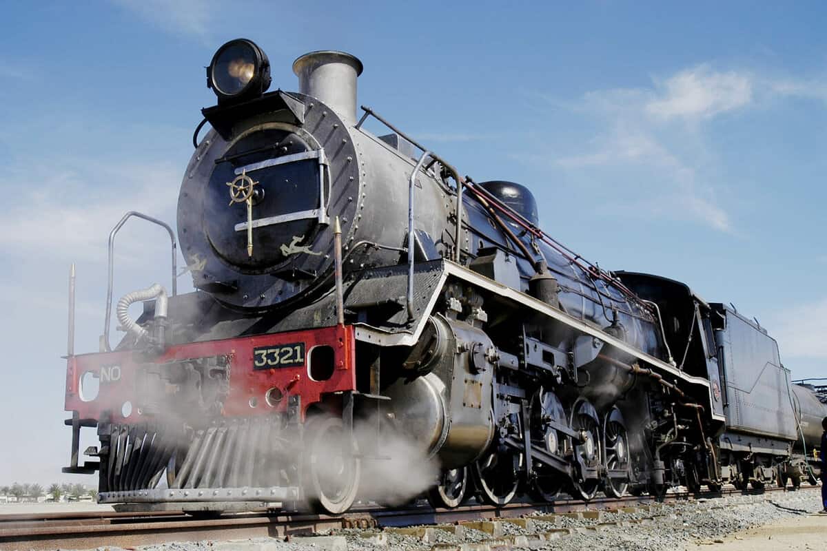 the front of the train with steam rising