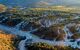 an arial shot at sunrise of the epupa falls