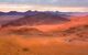 an arial shot of the orange Sossusvlei Desert