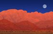 Bright red dunescape glowing in the moonlight