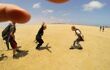 Two tourists scream at each other in delight after landing