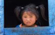 Tibetan girl from the village of refugees in the Himalayas.