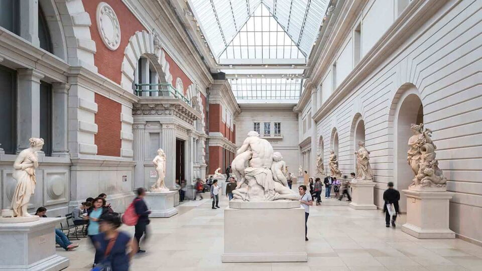 Sculptures on display in a gallery inside the Metropolitan Museum of art
