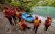 tour group receiving instructions on the shore from instructor