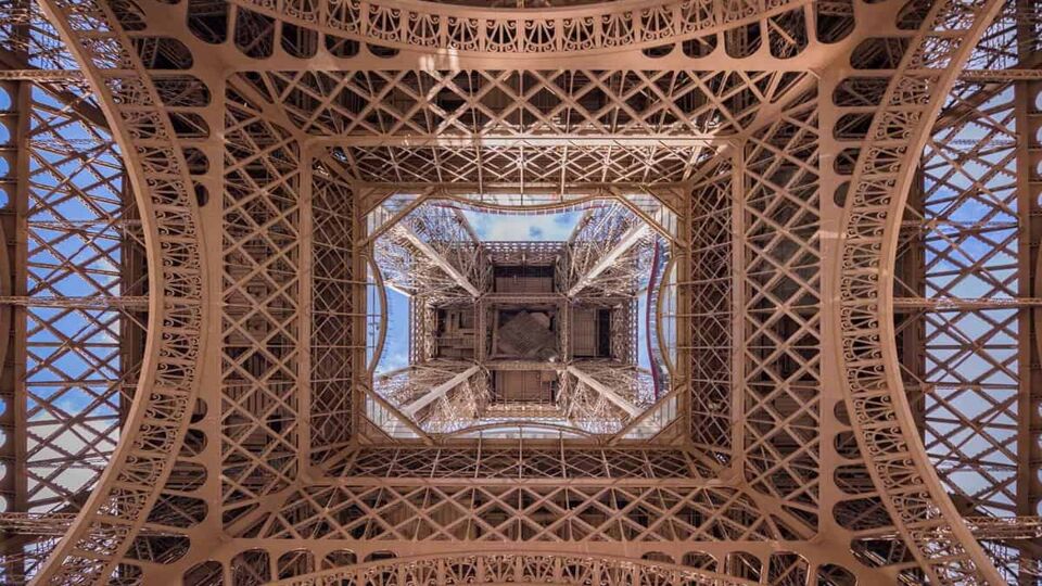 A view of the tower from beneath, detailing the symmetrical structure.