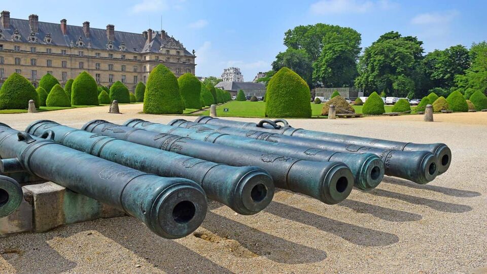 Historic Napoleonic artillery guns on display outside the museum