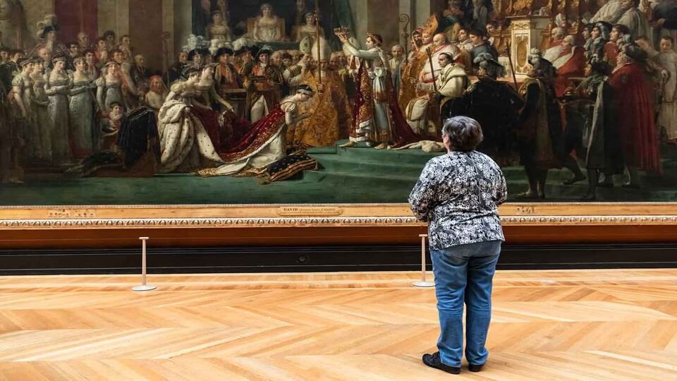 Woman staring at a very large art masterpiece