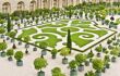 The ornamental gardens inside the Palace filled with a structured arrangement trees, shrubs and flowers