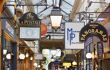 Shop signs in Passage des Panoramas, an old-fashioned arcade