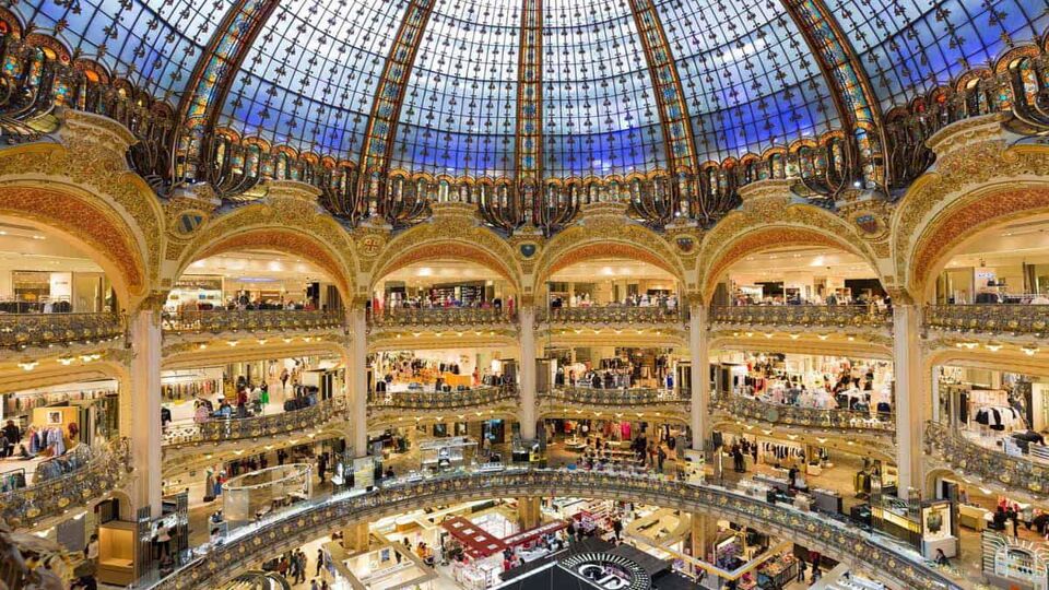Interior of the centre of the mall with four floors of shops and beautiful glass dome