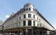 A front view of the best shopping mall Le Bon Marche on a sunny blue day