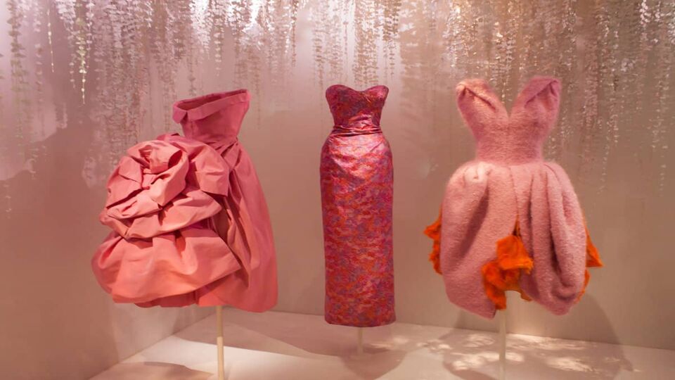 Three pink Dior gowns on exhibition in the museum
