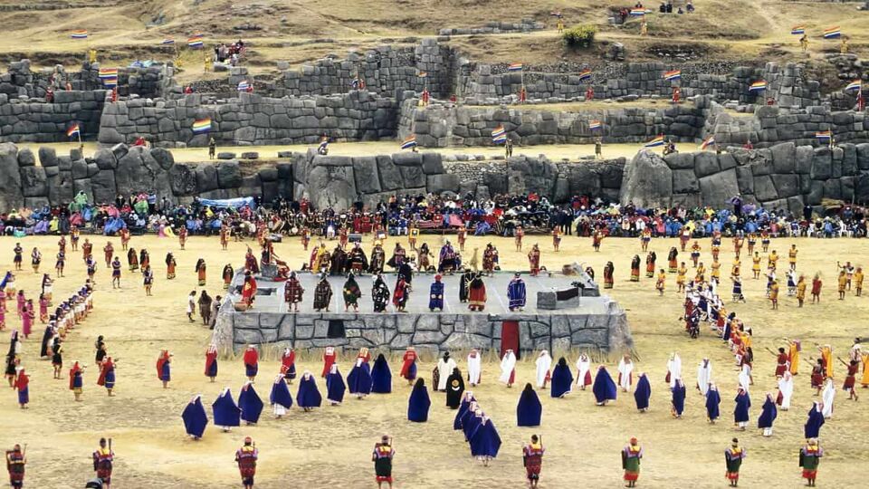 Performers in colour-coordinated clothes line up for the festival