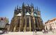 People walk at East end of the Metropolitan Cathedral of Saints Vitus and Cathedral square