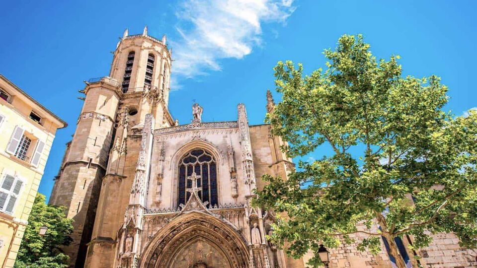 The exterior of Saint Saveur gothic cathedral seen from the ground on a sunny day