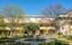 Garden of the hospital in Arles in autumn, with few trees on the leaves