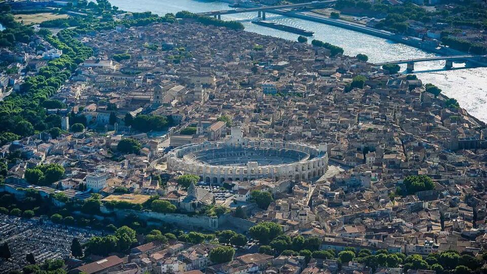 Aerial view of Arles, with the roman amphitheatre and river visible