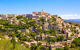 aerial view of gordes on top of a hilltop in provence