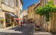 A sunlit street in the hill top village of Lourmarin