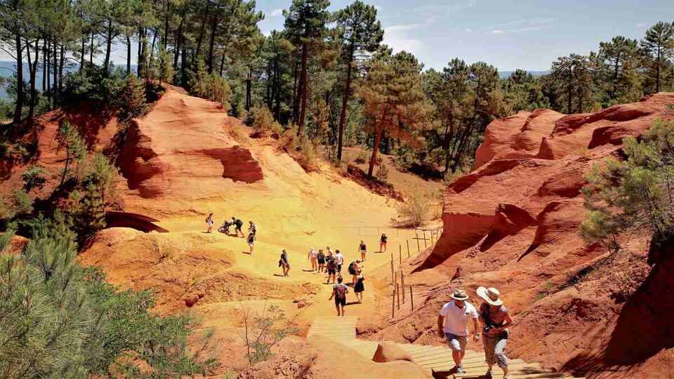 tourists wandering through the Ochre Trail