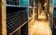 Bottles stacked on shelves in a wine celler