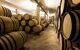 Barrels stacked in a wine cellar