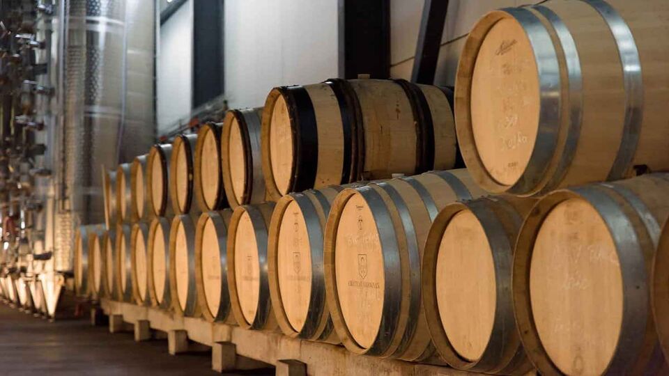 Stacked barrels at a wine estate