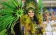 Close up of a woman dancer dressed in feathers