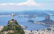 Christ on mountain top with view of the city behind