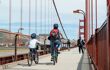 Parent and child cycling over the Golden Gate Bridge, San Francisco to Sausalito