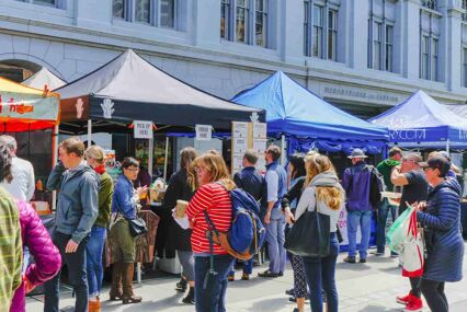 Outdoor food amrket with stalls at the Ferry Buidling Marketplace