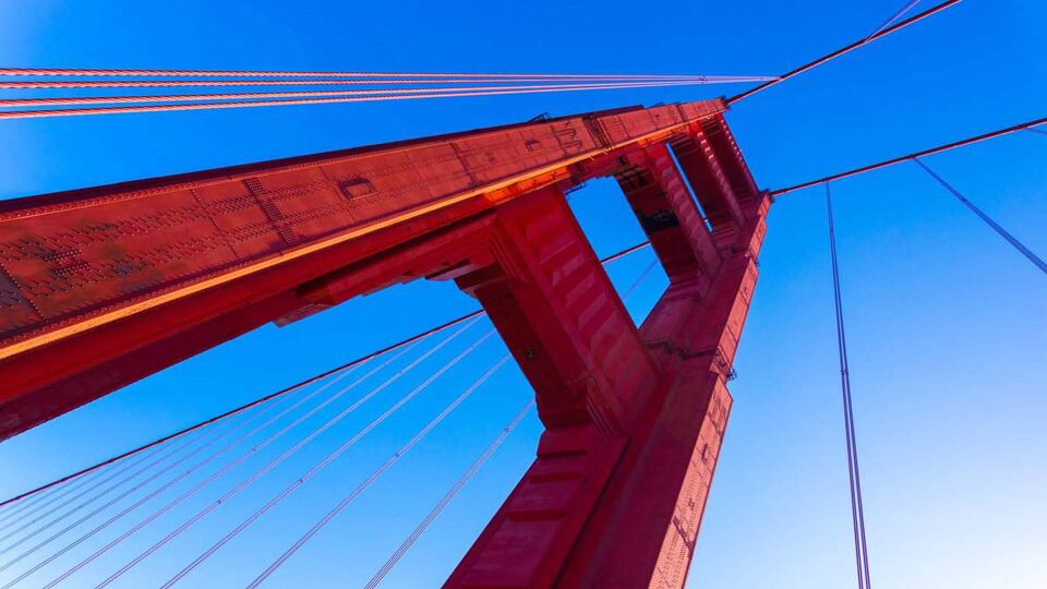 looking up at a supporting arm of the Golden Gate Bridge