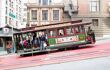 Powell Hyde cable car, an iconic tourist attraction. The San Francisco cable car system is the world's last manually operated cable car system.