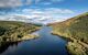 View down the canal between hillsides