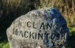 A large round grey stone with Clam Mackintosh engraved on it
