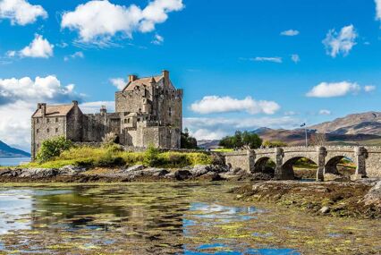 View of the castle and bridge over the surrounding water