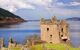 Ruined castle in the foreground, the loch stretches away behind