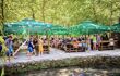Parasols and dining area outside in woods