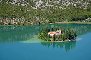 A small island with a Christian monastery on river Krka called Visovac, Croatia (Europe)