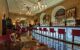 Hotel bar with red stools