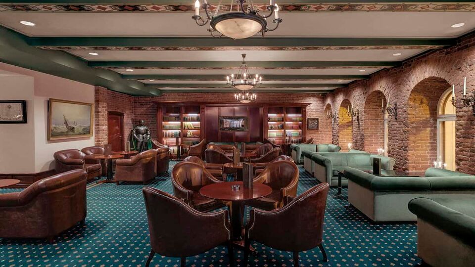 Bar with leather arm chairs