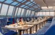 Glass roof restaurant with panoramic views over city