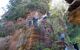 A steep staircase going up a rocky mountain.