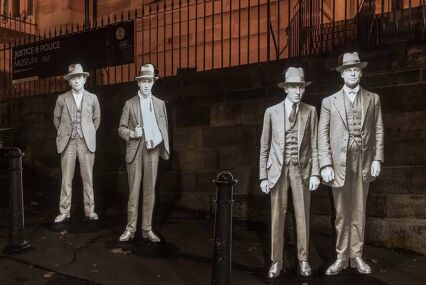 Four cardboard cut outs on display in the justice museum sydney